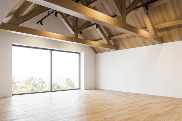 Corner of spacious empty attic room with white walls, wooden floor and roof and big window with blurry tropical view. 3d rendering