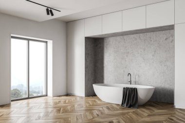 Ahşap zemini, beyaz ve beton duvarları, rahat bir küveti ve dağ manzaralı büyük bir penceresi olan geniş bir çatı katı. 3d oluşturma