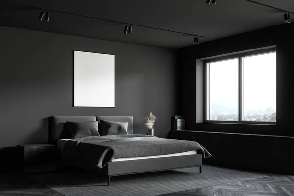 Interior of minimalistic master bedroom with grey walls, dark wooden floor, comfortable king size bed standing on the carpet, window with mountain view and vertical mock up poster frame. 3d rendering