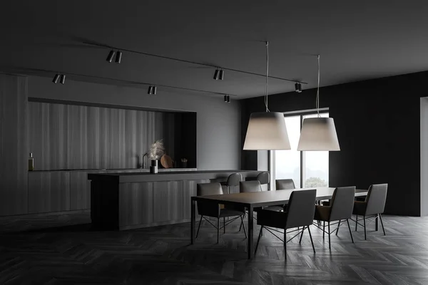 Corner of modern kitchen with grey and wooden walls, dark wooden floor, wooden countertops, bar with stools and long dining table with massive lamps hanging above it. 3d rendering