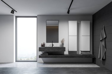 Beyaz ve gri fayanslı duvarları olan çatı katı otel banyosunun içi beton zemin ve dikey aynalı ve kırsal manzaralı büyük pencerenin yanında duran devasa taş lavabo. 3d oluşturma