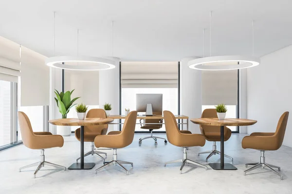 Interior of stylish panoramic CEO office with white walls, columns, concrete floor, white and wooden computer desk and two round coffee tables with beige armchairs. Blurry city. 3d rendering