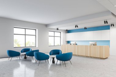 Rahat mavi koltuklar ve ahşap resepsiyon masası modern hastane salonunda beyaz ve mavi duvarlı duruyor. Sağlık hizmetleri kavramı. 3d oluşturma
