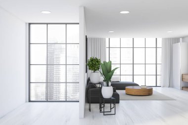 Beyaz duvarları, ahşap zemini, yuvarlak sehpanın yanında duran rahat gri kanepe ve sağında bulanık şehir manzarası olan pencerenin içi. 3d oluşturma