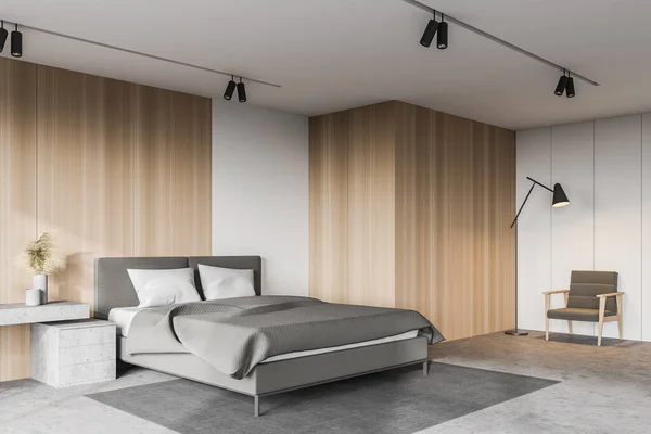 白と木製の壁 コンクリートの床 テーブルと床ランプ付きのアームチェア付きの居心地の良いキングサイズベッドルームのコーナー 3Dレンダリング — ストック写真