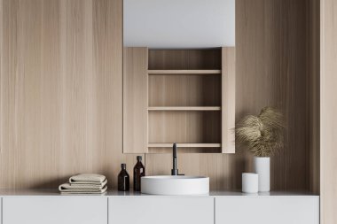 Modern banyodaki ahşap duvarlı dikey aynayla beyaz tezgahın üzerinde duran yuvarlak lavaboyu kapatın. 3d oluşturma