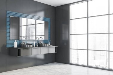 Gri fayanslı, mavi duvarlı, beton döşemeli, rahat çift lavabolu ve gri tezgahın üzerinde duran rahat ana banyonun köşesi. Bulanık şehir manzaralı bir pencere. 3d oluşturma