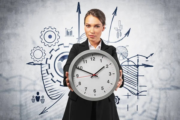 Young European Businesswoman Showing Office Clock Standing Concrete Wall Blurry — Stock Photo, Image