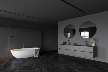 Modern banyonun köşesinde gri ve siyah tuğlalı duvarlar, koyu ahşap zemin, rahat beyaz küvet ve iki yuvarlak aynalı çift katlı lavabo. 3d oluşturma