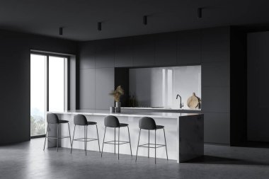 Modern mutfağın köşesinde beyaz ve koyu gri duvarlar, beton zemin, ocakta yapılmış gri tezgah, lavabo ve tabureli mermer bar. Bulanık dağ manzaralı bir pencere. 3d oluşturma