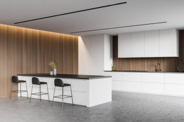 Modern mutfağın köşesinde beyaz ve ahşap duvarlar, beton zemin, beyaz dolaplar ve tezgahlar ve tabureli rahat bir bar var. 3d oluşturma