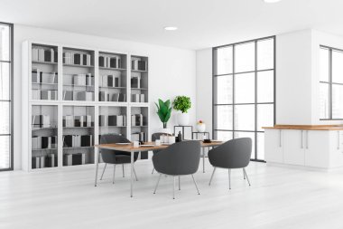 Beyaz duvarları, ahşap zemini, beyaz tezgahı, gri koltukları ve kitaplığı olan yemek masasının köşesi. Bulanık şehir manzarası. 3d oluşturma