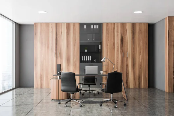 Interior of panoramic CEO office with gray and wooden walls, tiled floor, computer table with chairs for visitors and bookcases with folders. Blurry cityscape. Concept of management. 3d rendering
