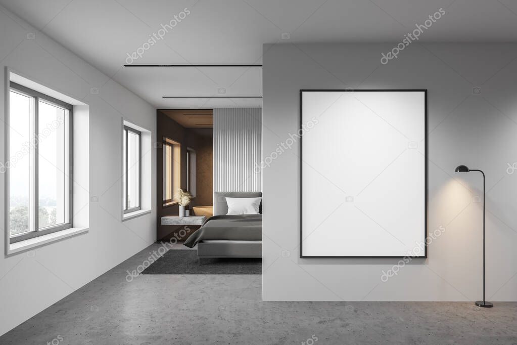 Vertical mock up poster hanging in stylish minimalistic bedroom with white walls, concrete floor, comfortable king size bed and bathroom in background. 3d rendering