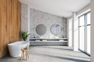 Lüks tavan arası banyosu, beyaz, taş ve ahşap duvarlar, fayanslı zemin, iki yuvarlak aynalı çift lavabo, rahat küvet ve bulanık şehir manzaralı panoramik pencere. 3d oluşturma
