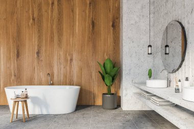 Modern banyo, beyaz ve ahşap duvarlar, fayanslı zemin, iki yuvarlak aynalı çift lavabo ve rahat beyaz küvet. 3d oluşturma