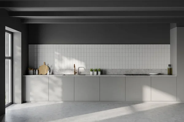 白とダークグレーの壁 コンクリートの床とシンクと炊飯器を内蔵した灰色のカウンター付きのスタイリッシュなミニマリストキッチンのインテリア 3Dレンダリング — ストック写真