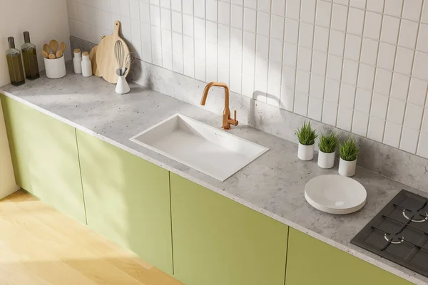 白いタイル張りの壁と木製の床とモダンなキッチンに立ってシンクを内蔵緑のカウンタートップビュー 3Dレンダリング — ストック写真