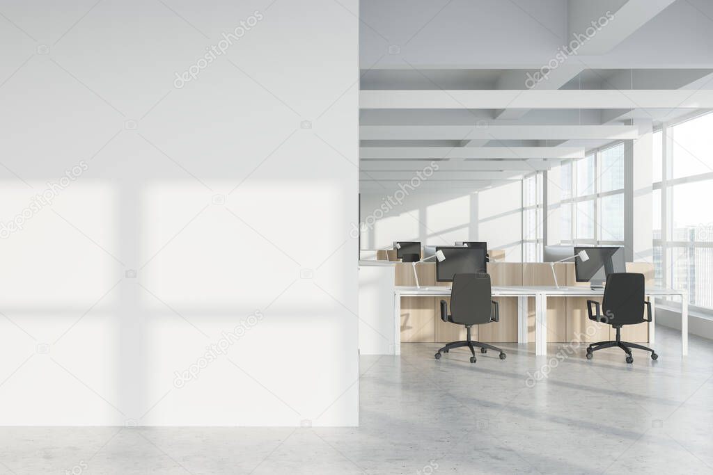 Interior of modern Industrial style open space office with white walls, concrete floor, rows of computer tables and panoramic windows with blurry cityscape. Mock up wall. 3d rendering