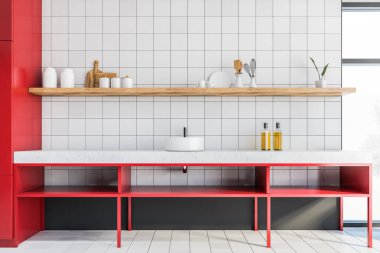 Beyaz fayanslı duvarları ve zemini olan şık bir mutfak, parlak kırmızı dolap ve lavaboda yapılmış taş tezgahlar. Tabaklı ahşap raf ve bulanık manzaralı pencere. 3d oluşturma