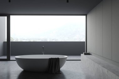 Koyu gri duvarlı panoramik banyonun içi, beton zemin, rahat küvet ve bulanık dağ manzaralı balkon. 3d oluşturma
