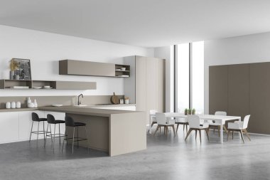 Modern mutfağın köşesinde beyaz duvarlar, beton zemin, bej dolaplar, beyaz tezgah, tabureli bar ve koltuklu beyaz yemek masası. Bulanık dağ manzarası. 3d oluşturma