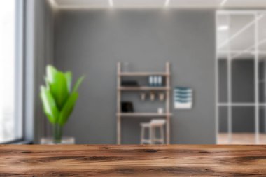 Ürününüz için ahşap masa bulanık, gri duvarlı, minimalist ofis taburesi ve klasörlü ahşap bilgisayar masası. 3D oluşturma maketi