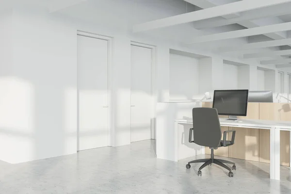 Cozy workplace in Industrial style open space office corner with white walls, concrete floor, rows of computer tables and panoramic window. 3d rendering