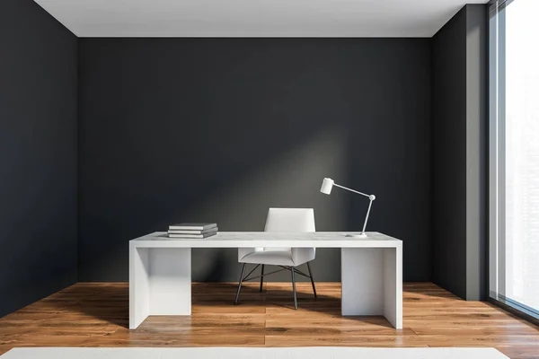 Interior of minimalistic CEO office with dark gray walls, wooden floor, panoramic window with blurry cityscape and white marble table. 3d rendering