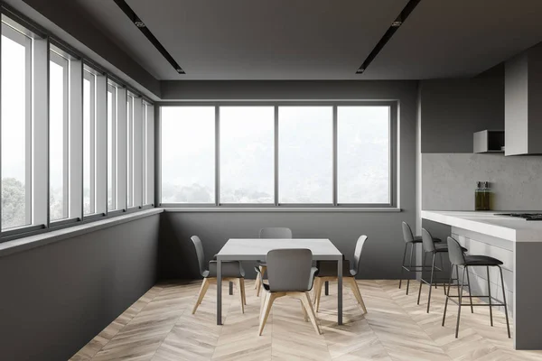 舒适的灰色餐桌 椅子矗立在时尚的厨房里 有灰色和石墙 木地板 有凳子的酒吧和山景模糊的窗户 3D渲染 — 图库照片