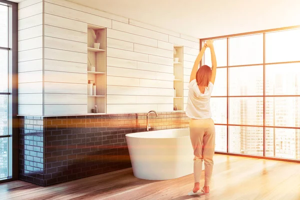 Young Woman Pajamas Standing Spacious Bathroom Wooden Grey Brick Walls — Stock Photo, Image