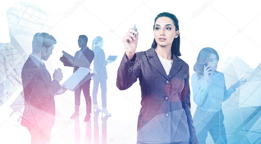 Beautiful young businesswoman writing with marker in blurry abstract city with her diverse teammates in background. Concept of leadership and planning. Toned image double exposure