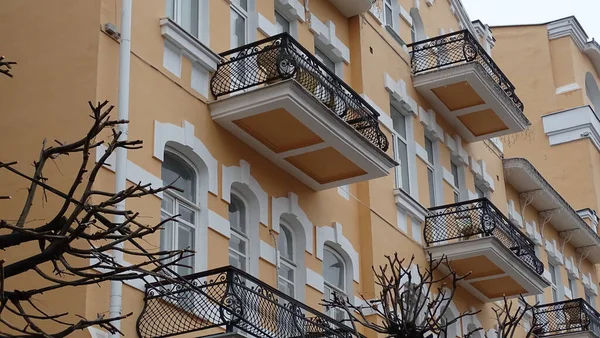 View of the balconies of the house of the last century from the street.