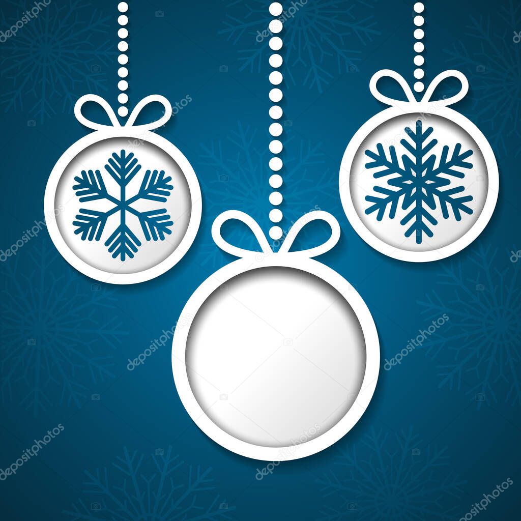 Christmas balls with paper snowflakes on a blue background