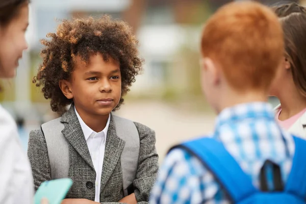 African Schoolboy Curly Hair Standing Talking Friends Outdoors School Lessons — ストック写真