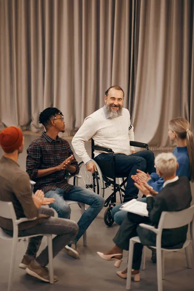 Senior Bearded Man Sitting Wheelchair Smiling While Other People Clapping — Stock Photo, Image