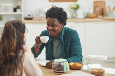 Man with his girlfriend drinking coffee