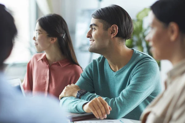 Business people listening speaker at meeting — Stock Photo, Image