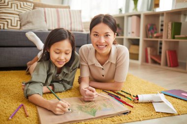 Girls Drawing Something Colourful