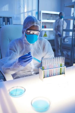 Medical Scientist With Virus Specimen