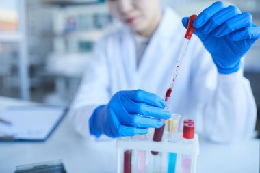 Unrecognizable Woman Developing Medication