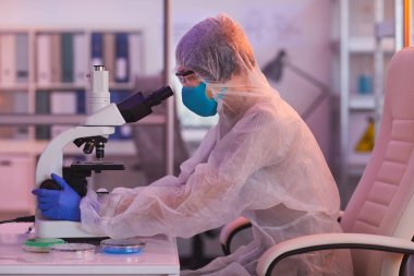 Unrecognizable Scientist Developing Vaccine