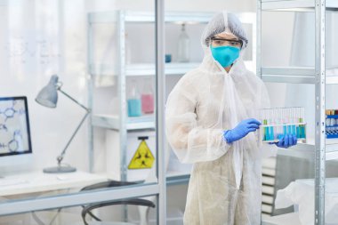 Unrecognizable Woman Holding Test-Tubes