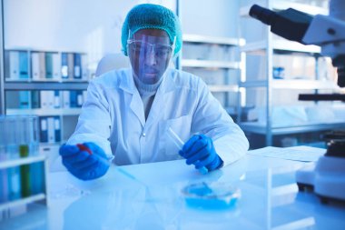 Male Pharmacologist At Work