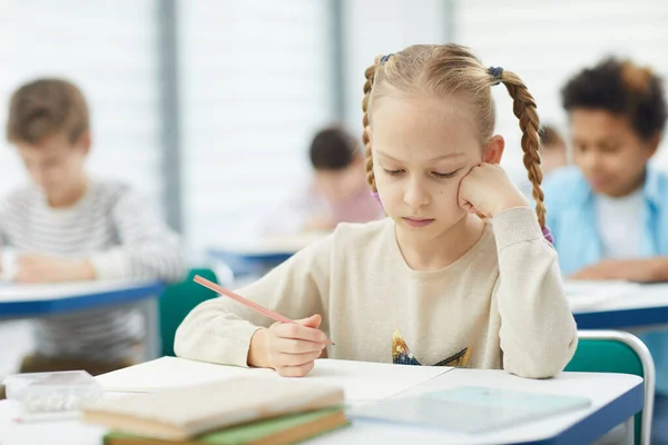 Little Caucasian Girl Completing Task — Stok Foto