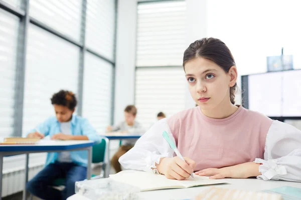 Attentive Girl Working In Class — Stock Fotó