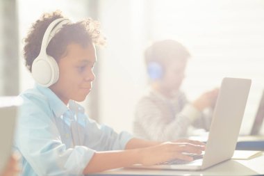 Black Boy Using Laptop
