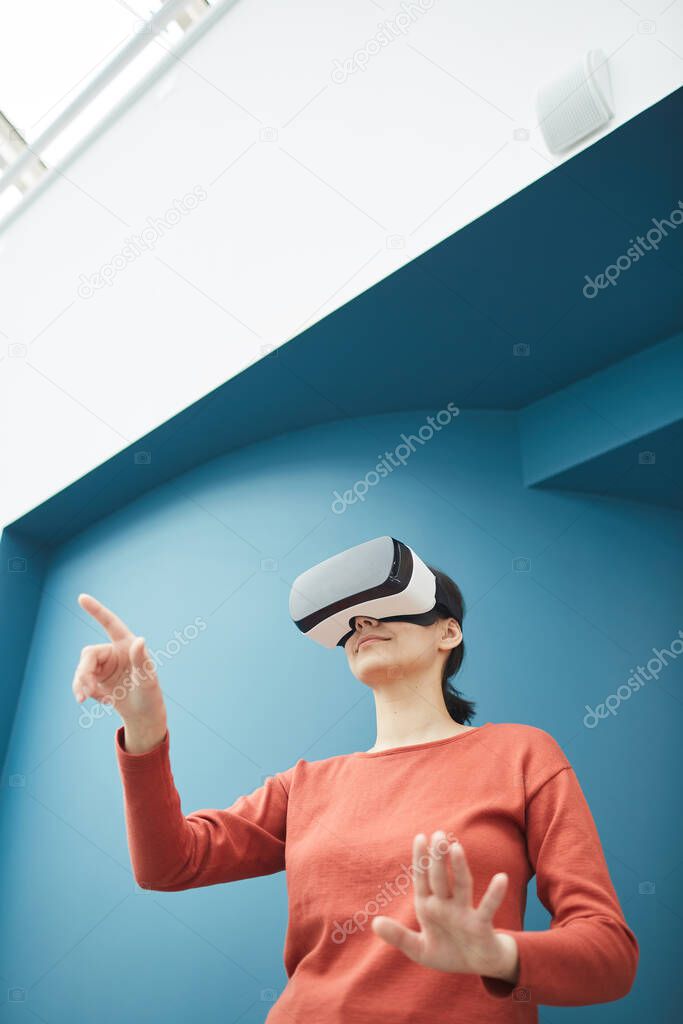 Woman playing in virtual game