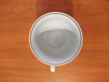 Cup on table wooden background