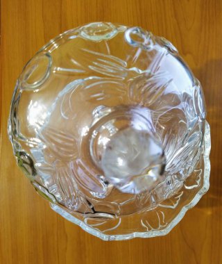 Candy bowl on wooden background